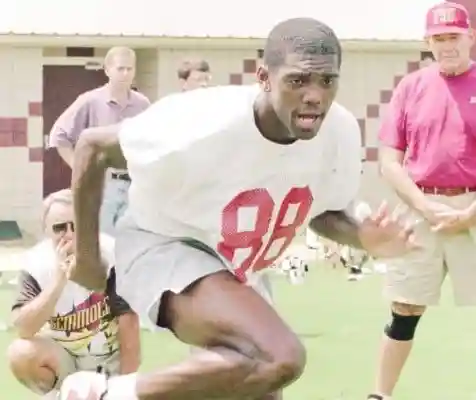 Jason Williams and Randy Moss in high school wearing the Nike Air