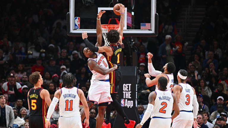Atlanta Hawks forward Jalen Johnson dunks on New York Knicks forward OG Anunoby.